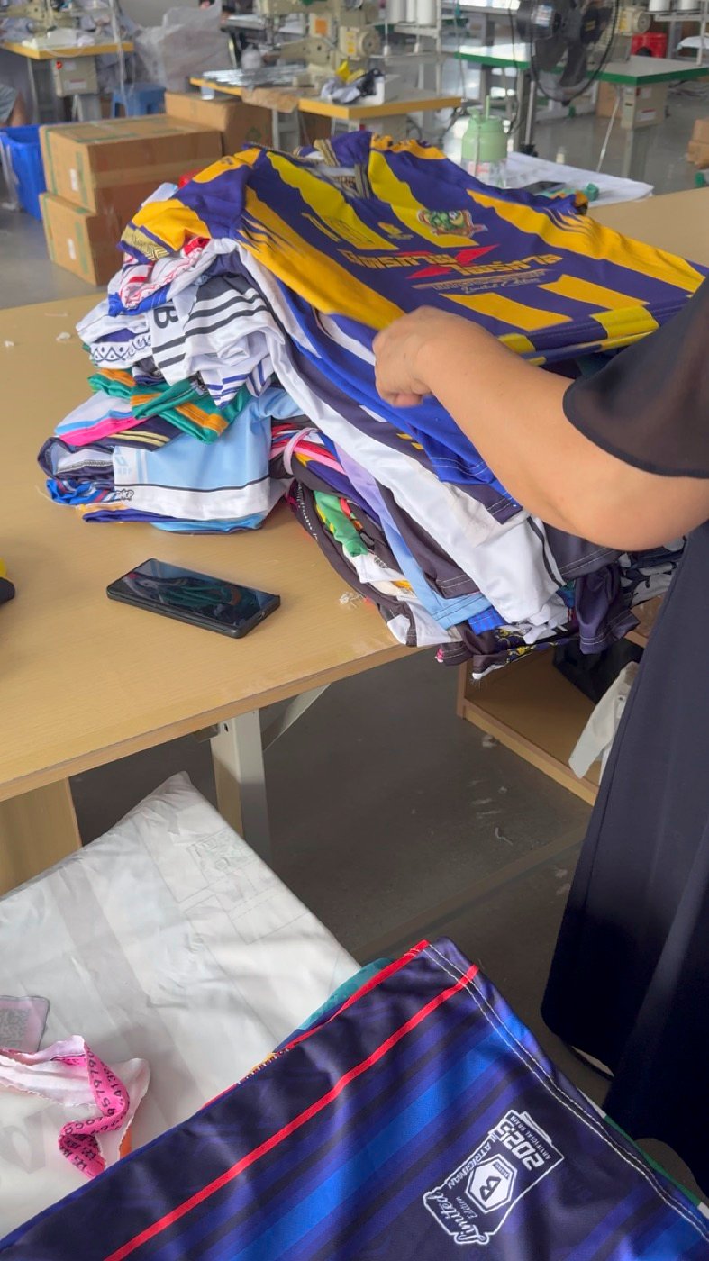Final garment inspection inside the KSM company-owned factory